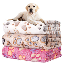 Couverture Rezutan pour chien au motif patte blanc, douceur et confort.