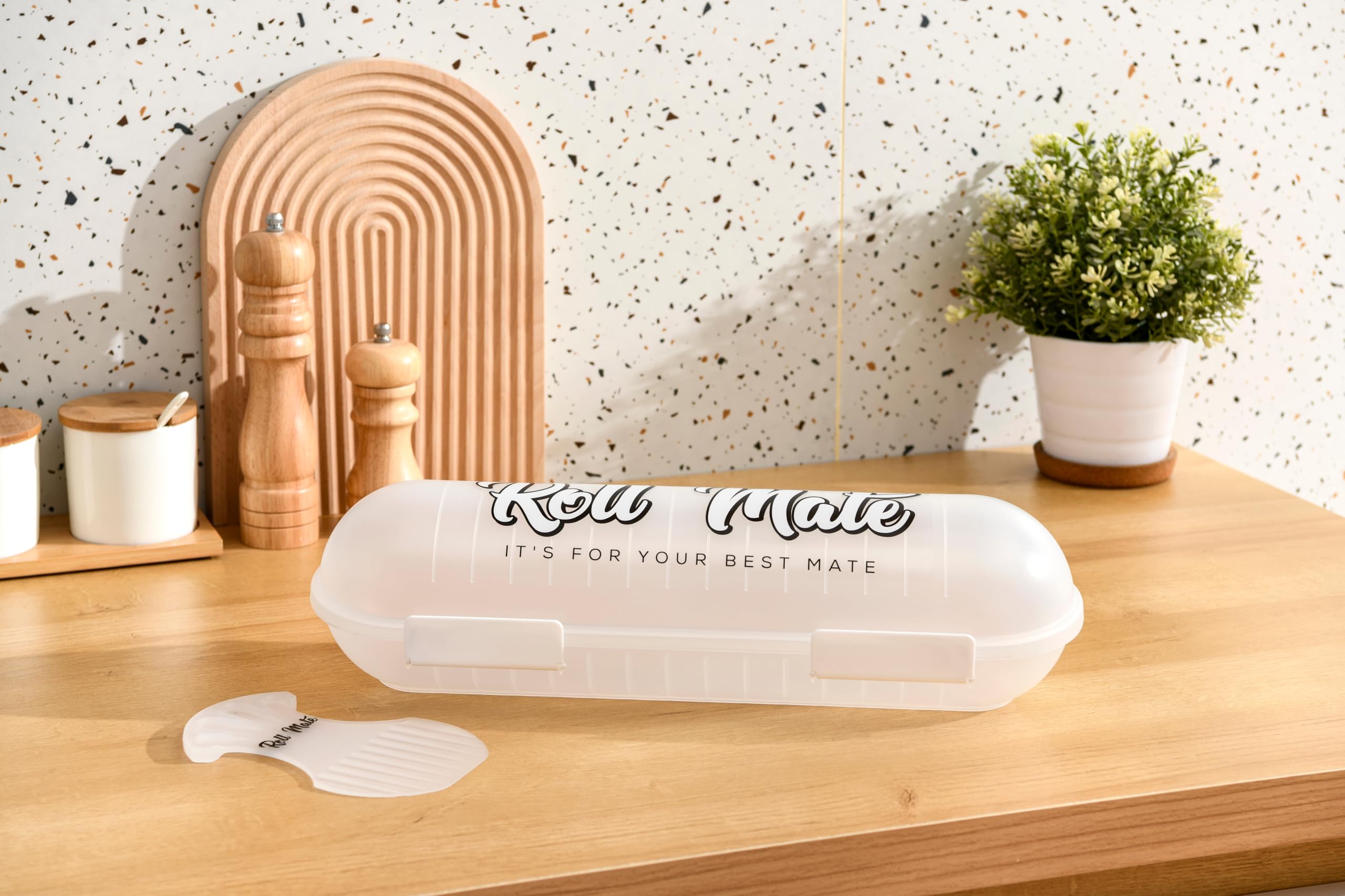 Roll Mate système anti-mess, réduit les éclaboussures dans le réfrigérateur.