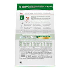 Croquettes rondes Royal Canin 12+ pour petits chiens, croquant agréable pour mâcher.