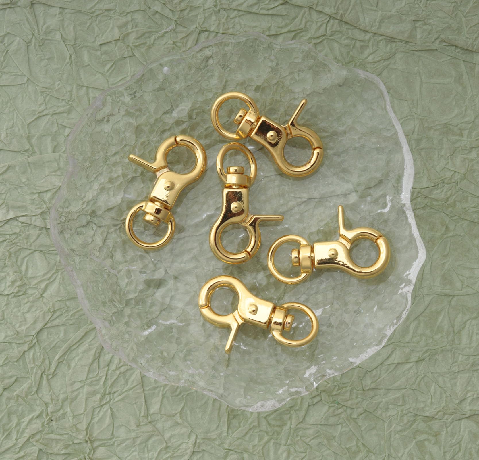 Anneaux métalliques polyvalents Ruwado en or pour colliers et harnais.