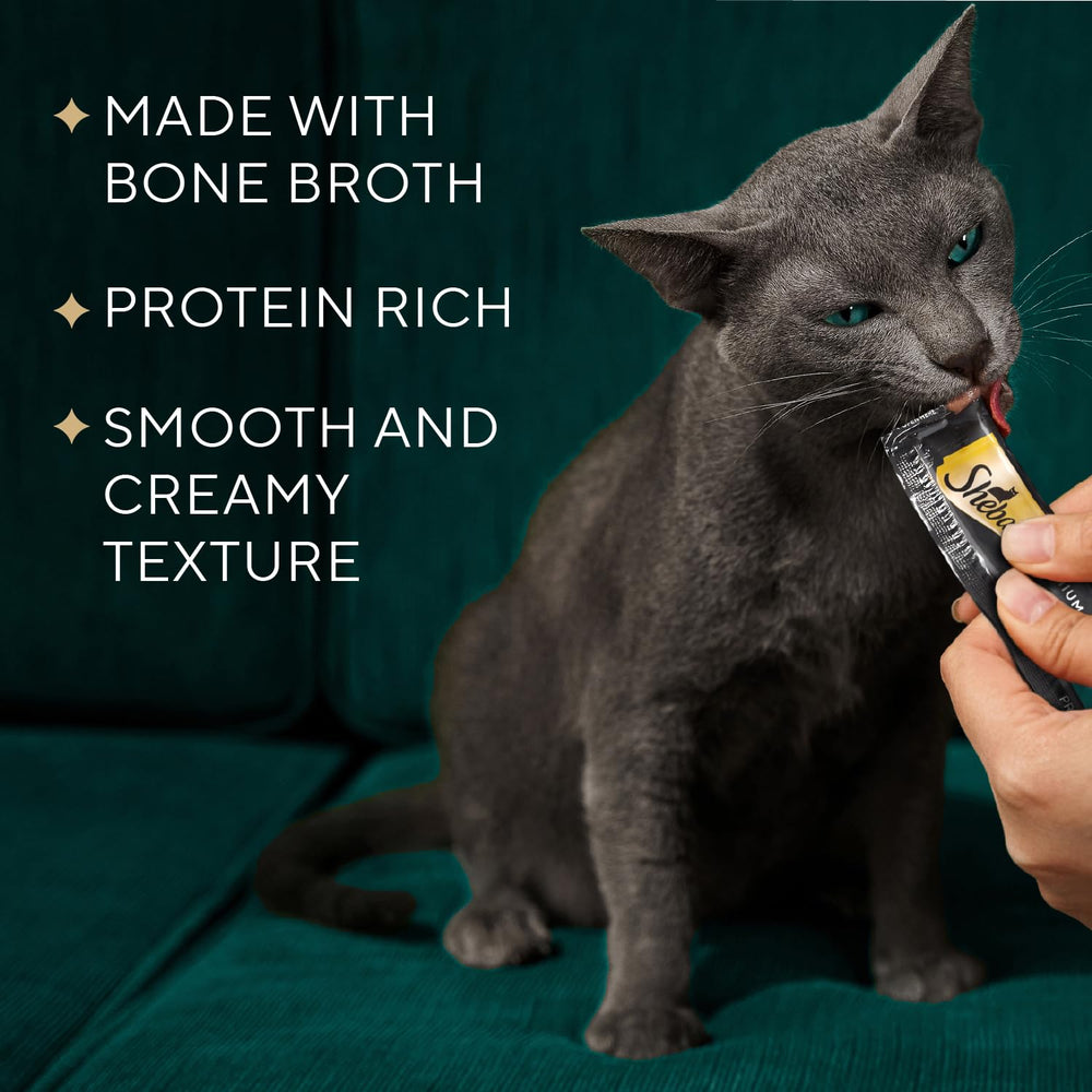 Friandise Sheba Premium Purée Chat saumon fumé, parfum appétissant et facile à servir.
