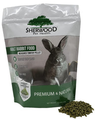 Sherwood Pet Health : lapin mange granulés au foin Timothy dans son bol, repas naturel.