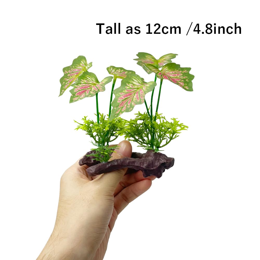 Le décor artificiel apporte une ambiance colorée et réaliste pour les poissons rouges.