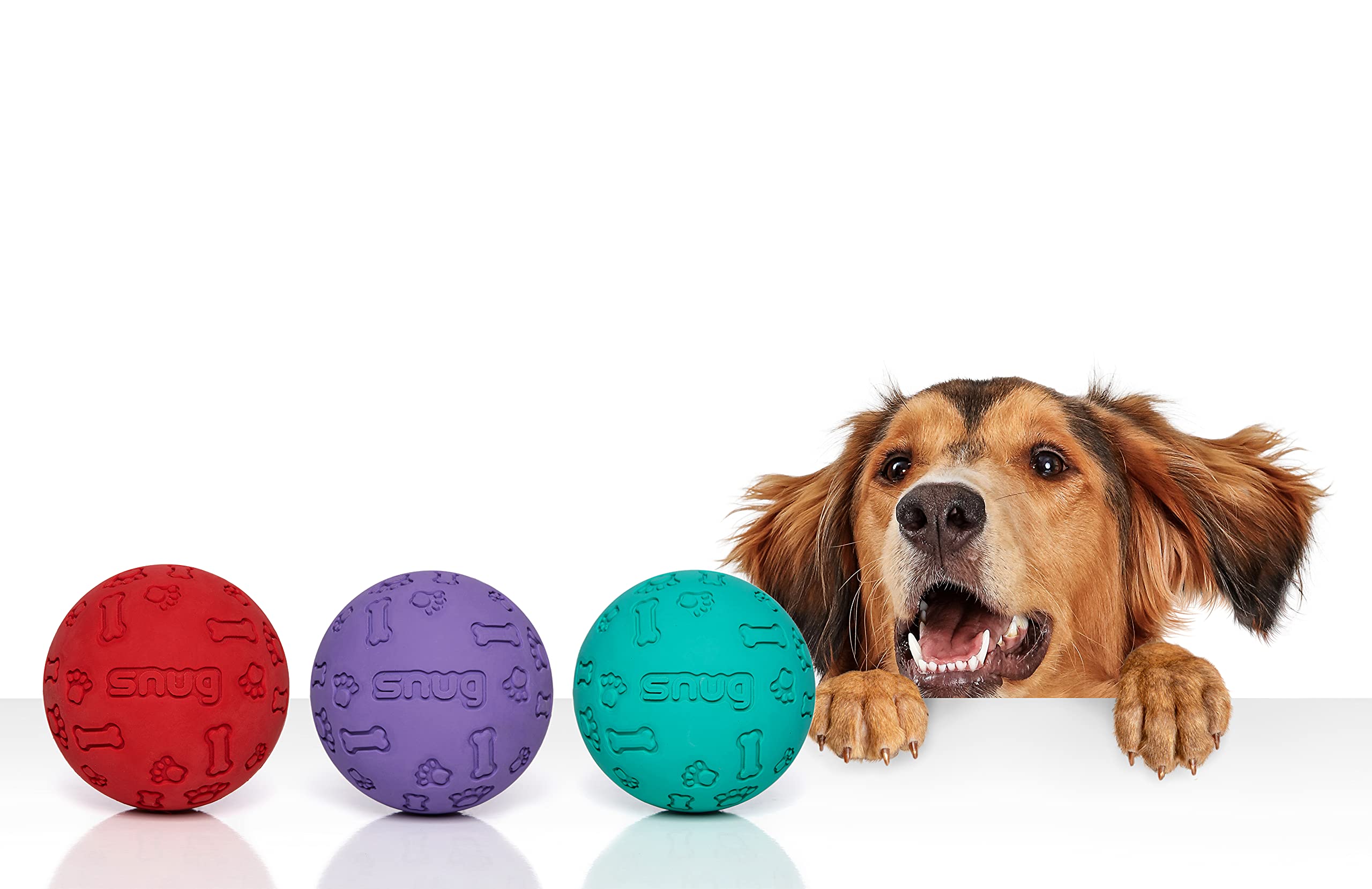 Balles Snug en caoutchouc pour chiens — gros plan sur la texture résistante.