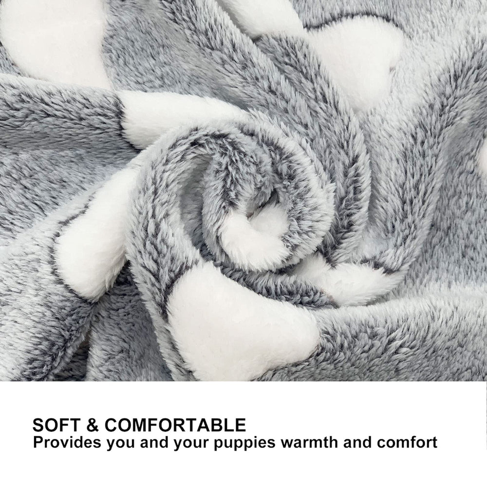 SORKUT doudou velours gris double-face : texture chaude et agréable.