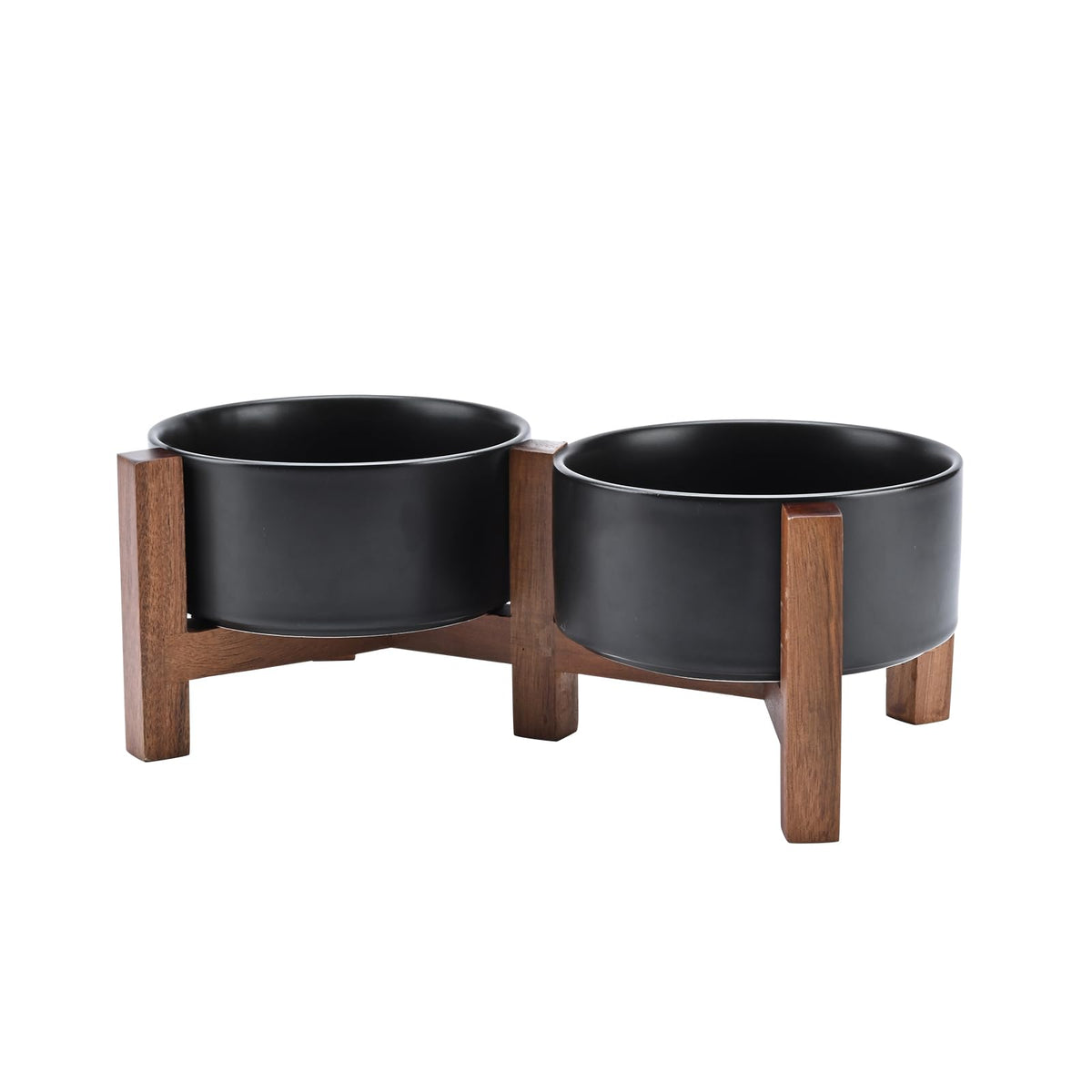 Bol SPUNKYJUNKY en céramique haute sur socle acacia noir pour repas surélevé.