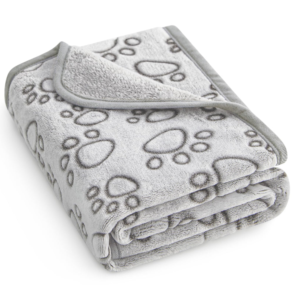 Stuffed: couverture pour petit chien, douceur idéale sur le canapé.