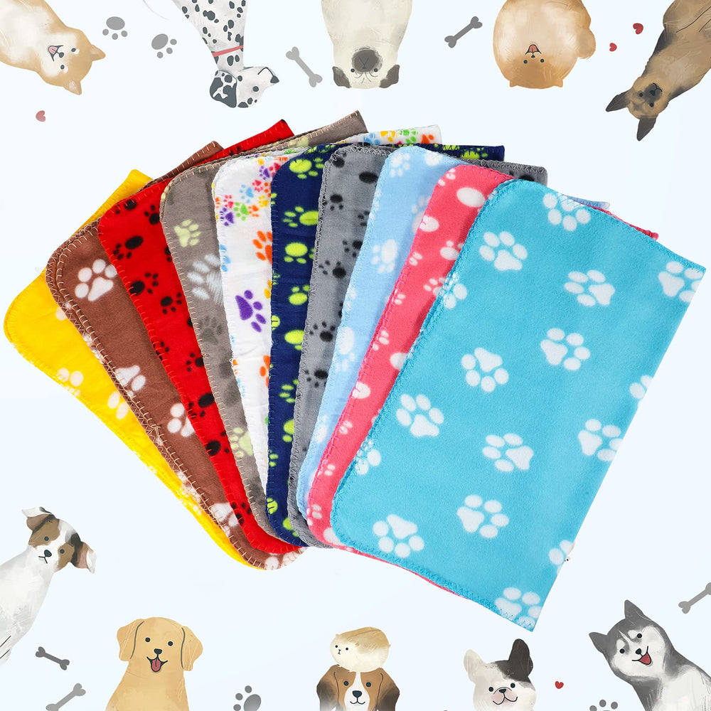 Couverture Tatuo, motif patte gris, douce et absorbante pour les petites bêtes.