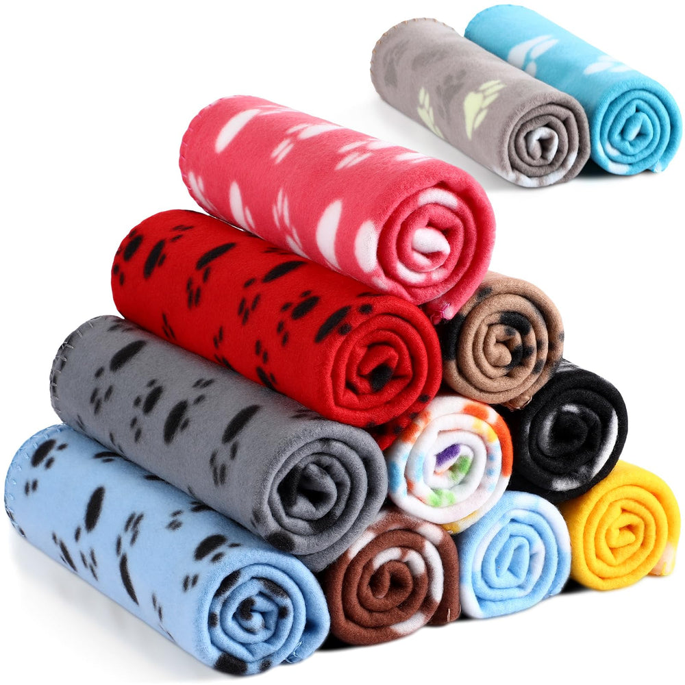 Couverture Tegeme en polaire avec motif patte imprimée, idéale pour le confort quotidien des animaux.