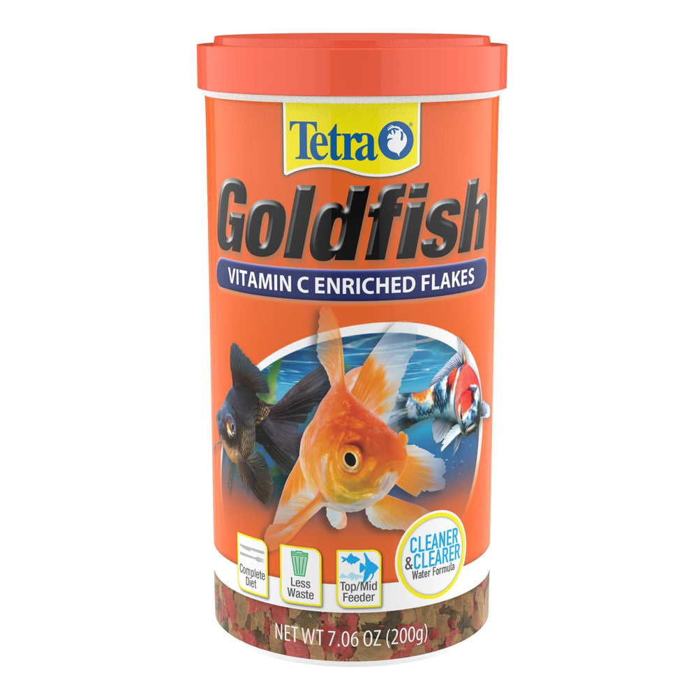 Tetra Goldfish Flakes dans le bocal, alimentation équilibrée pour poissons rouges.
