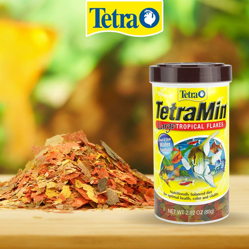 Emballage et flocons TetraMin XL Tropical Flakes visibles.