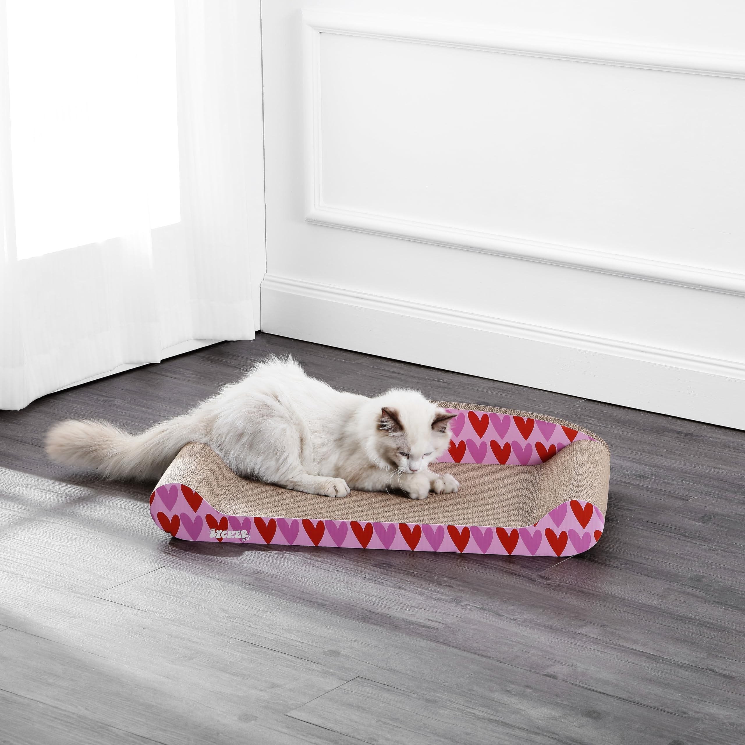 Grattoir Montego 27,5 au motif côtier rose pour intérieur élégant.
