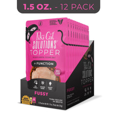 Topper Fussy Tiki Cat œuf et thon dans un bouillon riche et savoureux.