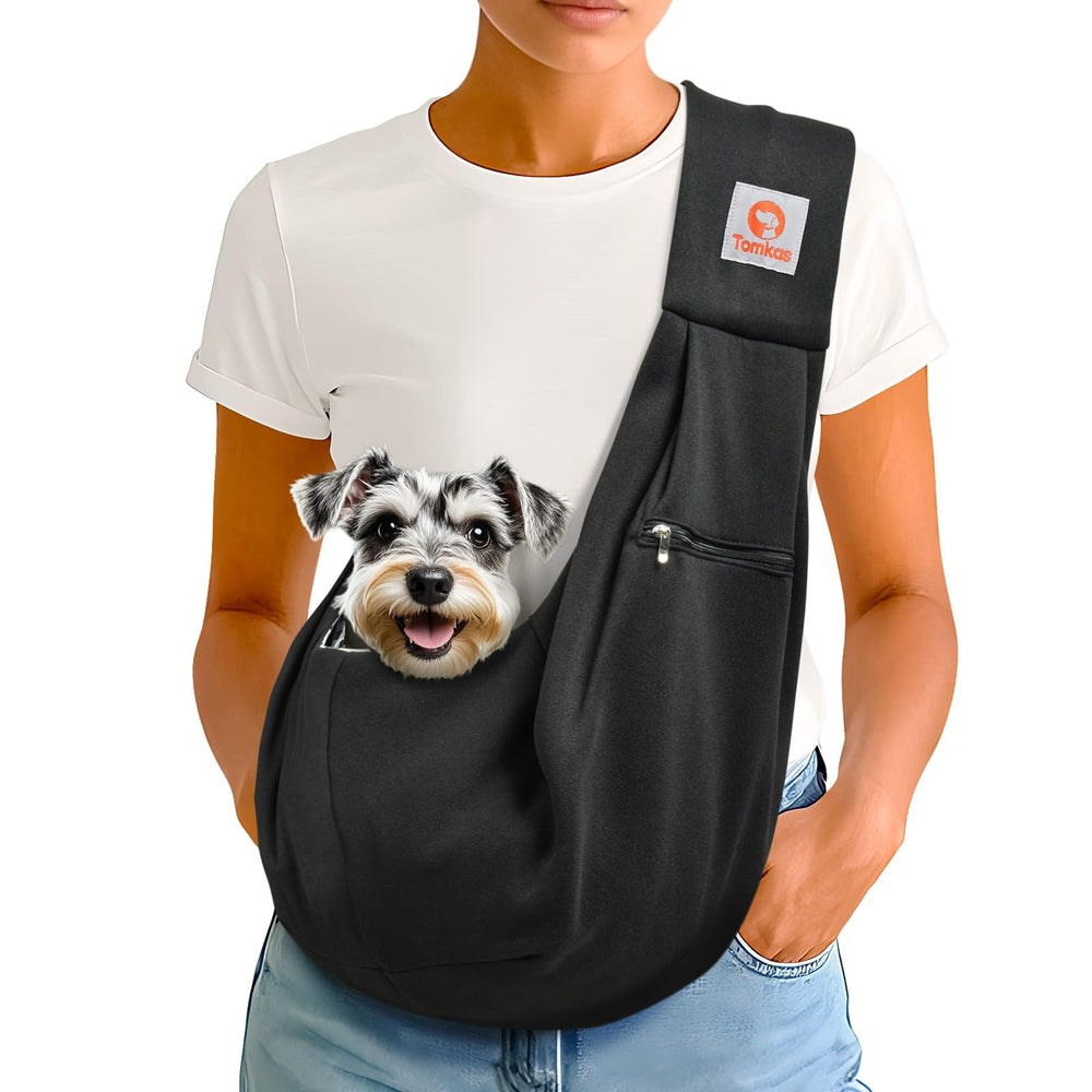 Tomkas sling ouverture grande pour faciliter l’installation du petit chien