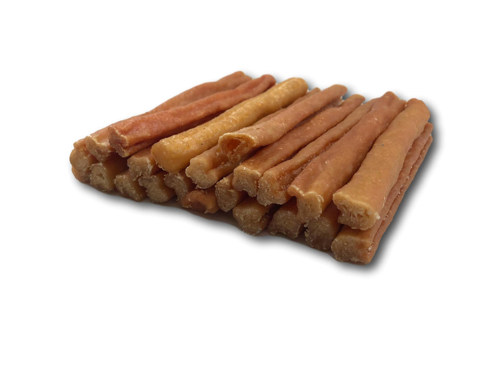 Top Dog Chews tendon de dinde – chien heureux profitant d'une récompense saine