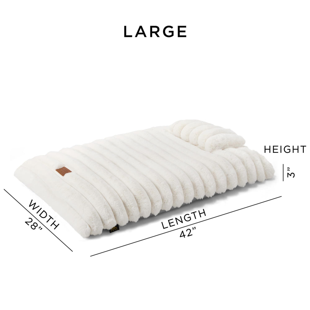 Town & Country Luxe CuddleTown présente l’oreiller intégré mini pour le soutien du cou.