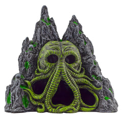 Toy Vault Cthulhu monstre dans une grotte d'aquarium, ambiance mystérieuse.
