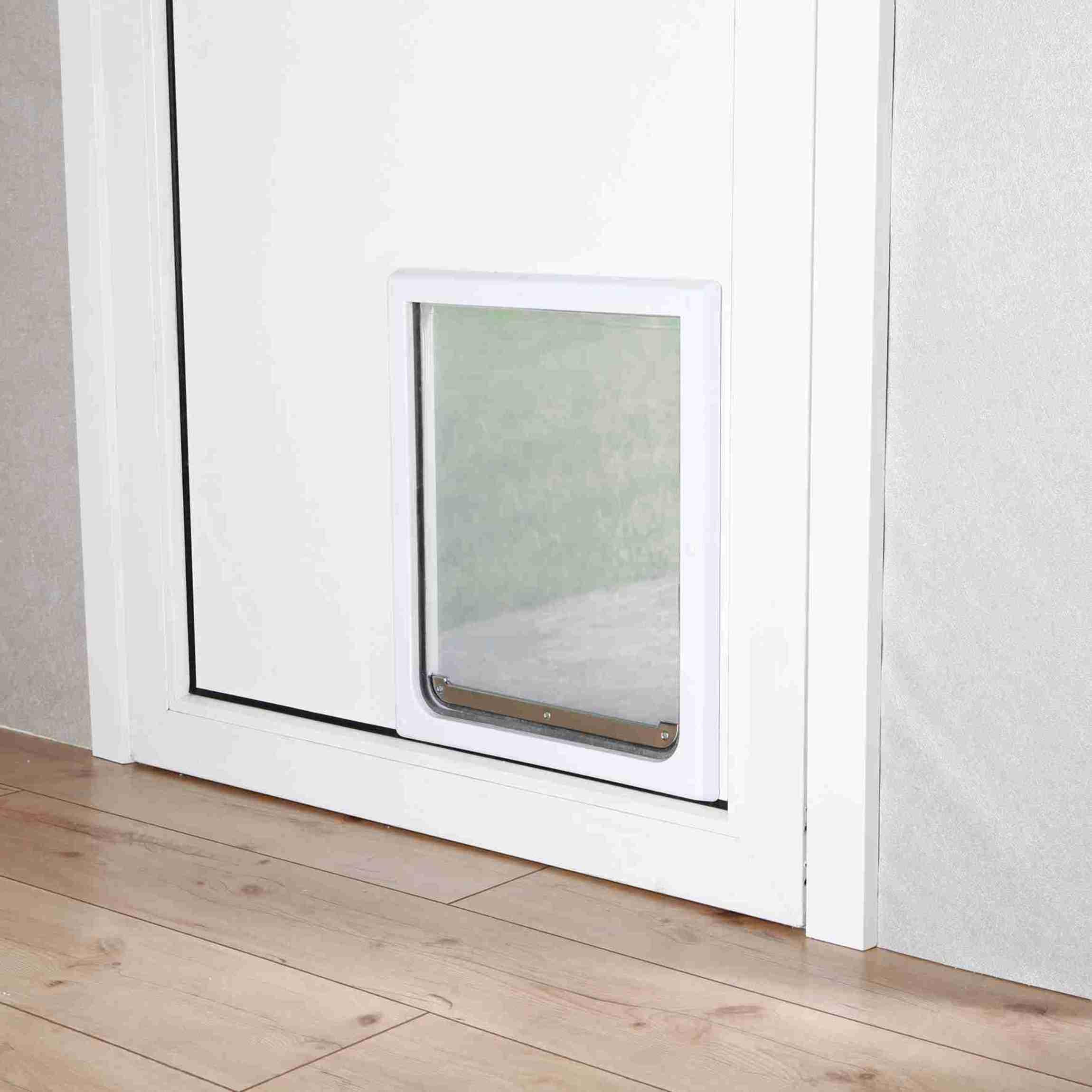 Cadre TRIXIE en plastique blanc pour porte chien durable et silencieux.
