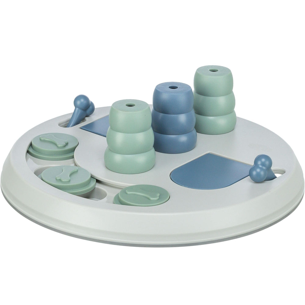TRIXIE Flip Board XXL : visage de chien explorant le puzzle pour stimulation mentale.