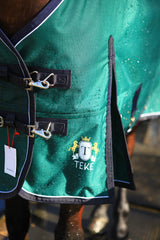 T TEKE Deluxe Turnout – goussets épaule généreux pour liberté de mouvement.