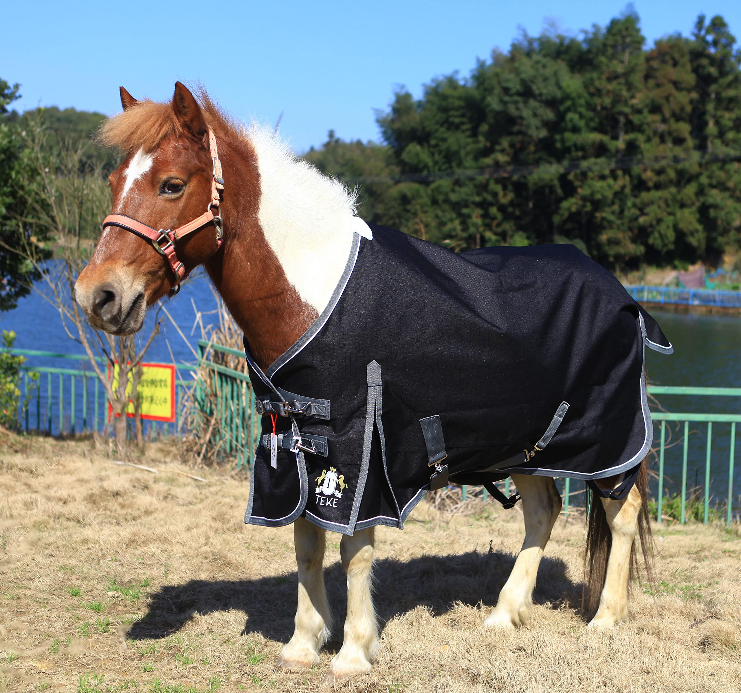 Fermetures avant à clips rapides sur T TEKE Deluxe Turnout facilité d’habillage