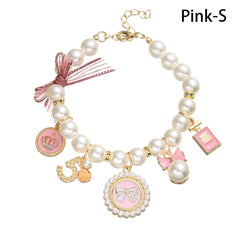 Collier Tustao perles rose pour chat, touche chic.