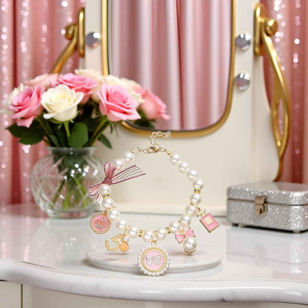 Collier Tustao perles rose facile à porter.