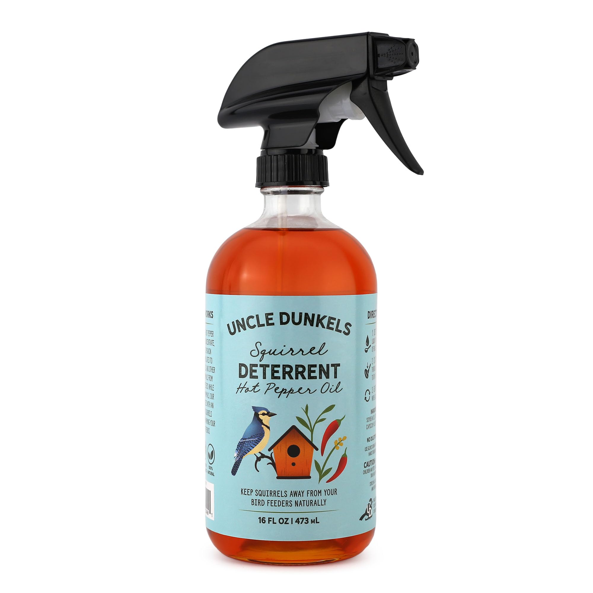 Bouteille Uncle Dunkels prête à être utilisée pour dissuasion des écureuils autour des graines.