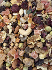 Versele-Laga Goldenfeast Caribbean Blend dans un bol – enrichissement et variété pour les oiseaux.