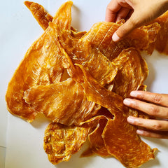 Vet Recommended : tranches de poulet séché pour chien, friandise protéinée pour chiens actifs.