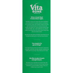 Vita Bone Original Biscuits chien mangeant, alliant plaisir et prise en charge quotidienne.