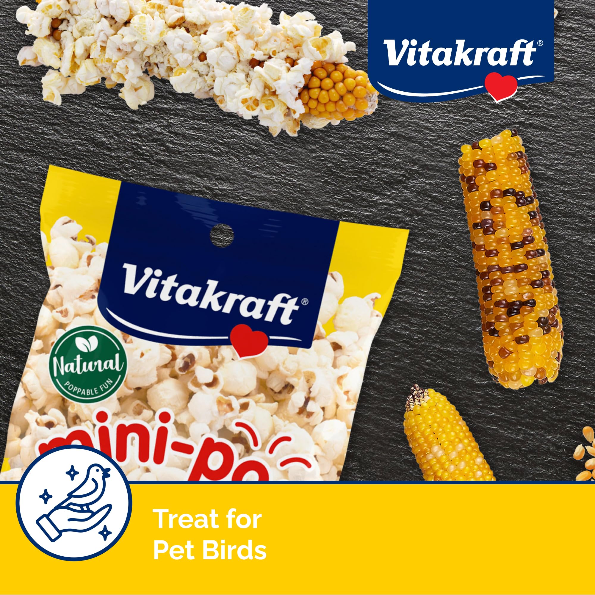 Vitakraft Mini-Pop oiseau dégustant le goûter direct, snack rapide et engageant.
