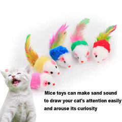 Souris VOVIGGOL avec sable argenté qui tinte, attirant la curiosité du chat.