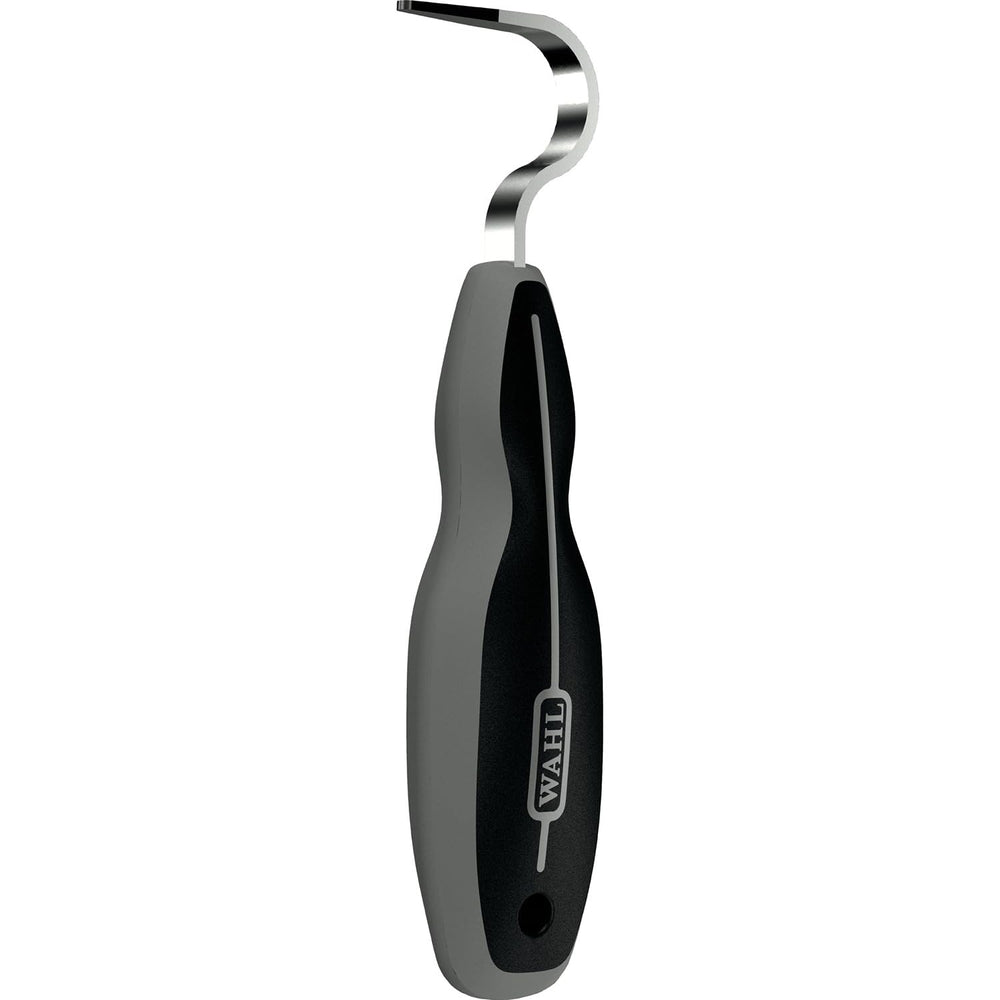 Outil de nettoyage des sabots Wahl avec poignee confort pour une prise sûre.