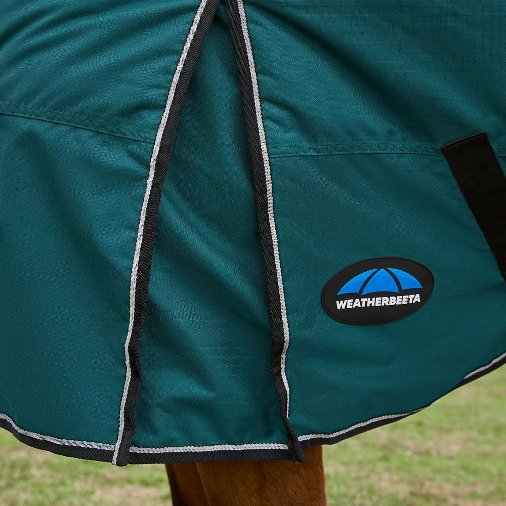 WeatherBeeta ComFiTec Classic Turnout 360g: sangles de jambe reglables assurent maintien et sécurité.