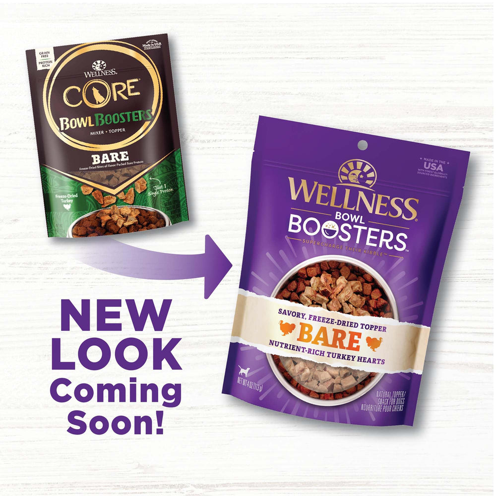 Wellness Bowl Boosters saupoudré sur croquettes sèches pour plus de saveur.