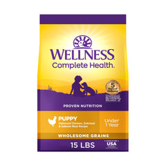 Wellness Complete Health croquettes pour chiots, protéines élevées et énergie durable.