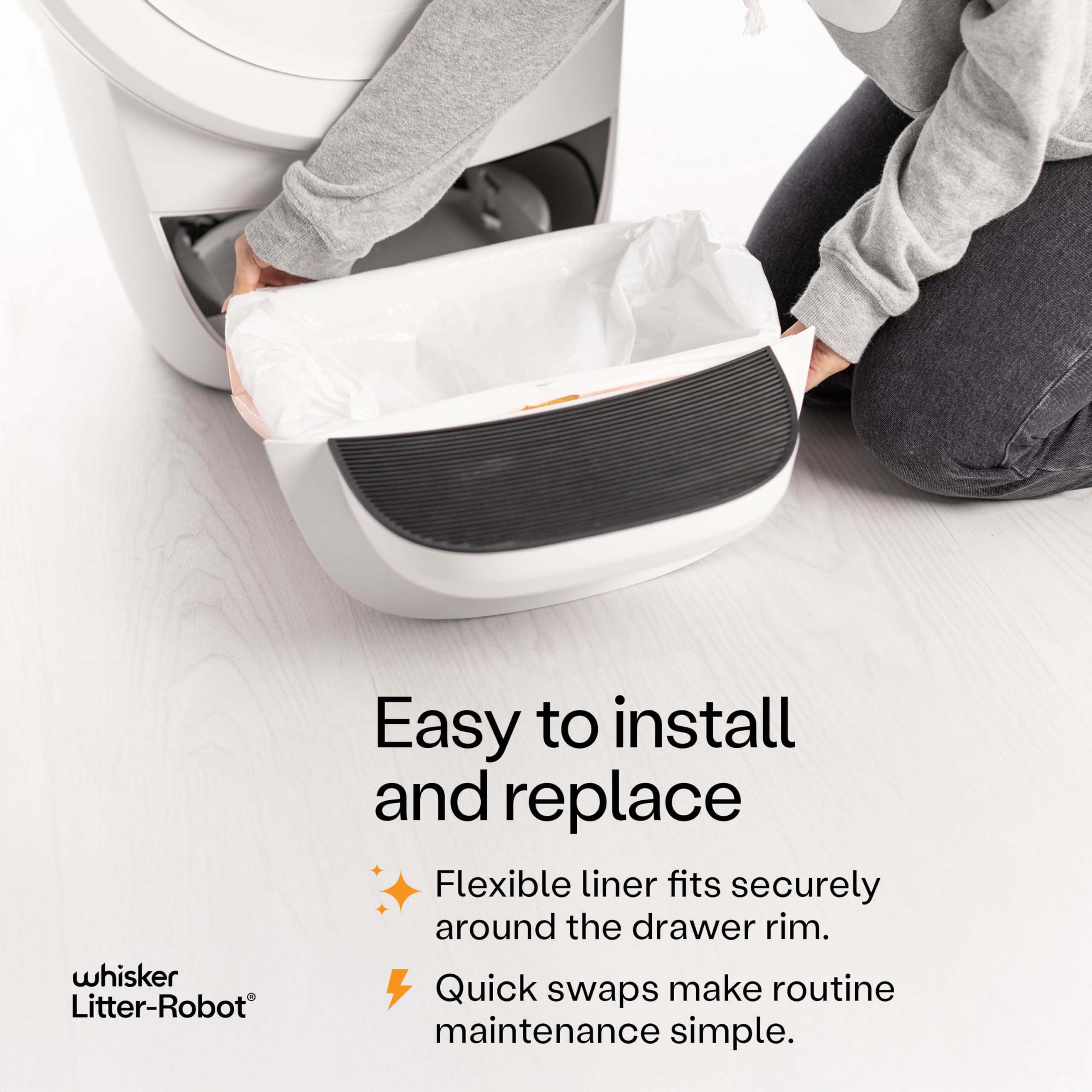 Whisker Litter-Robot: sacs-a-cordon rapides à installer dans le tiroir-déchets.