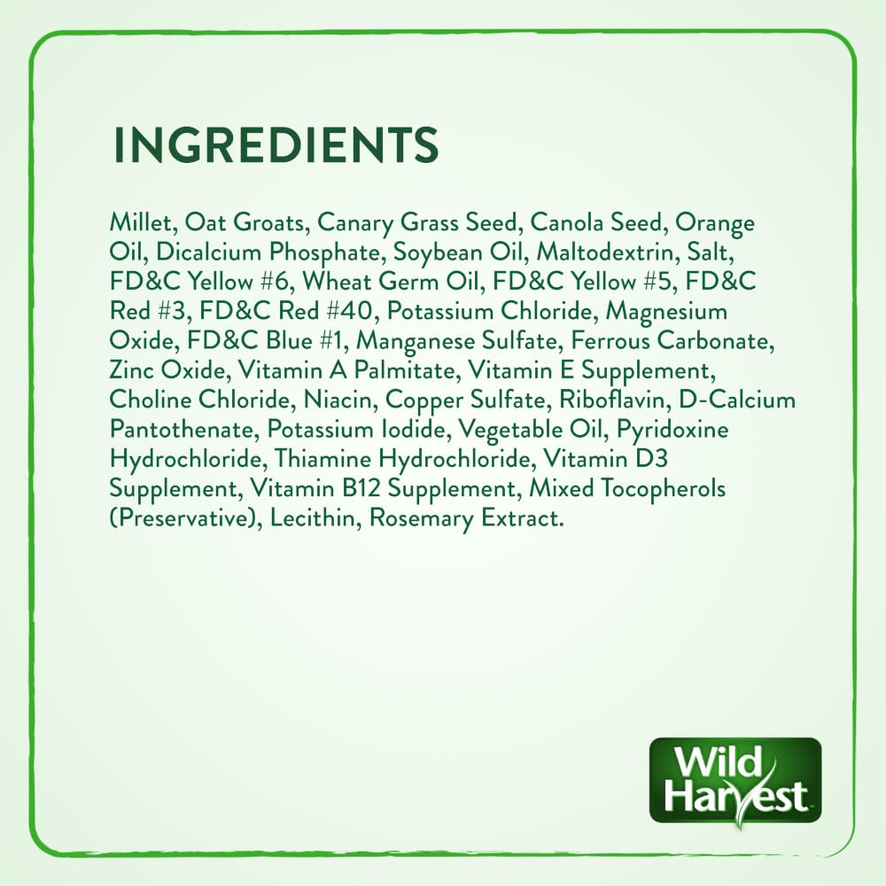 Wild Harvest Daily Blend – pinsons picorant les graines, énergie naturelle au quotidien.