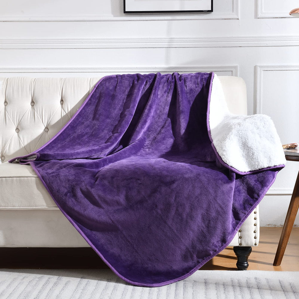 Couverture Yaning imperméable sur lit et canapé, protection contre les liquides et taches.
