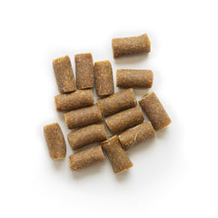 Friandises canard réel et pomme comme récompense lors des entraînements.